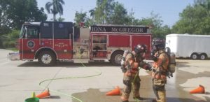 firefighters gross decon efforts